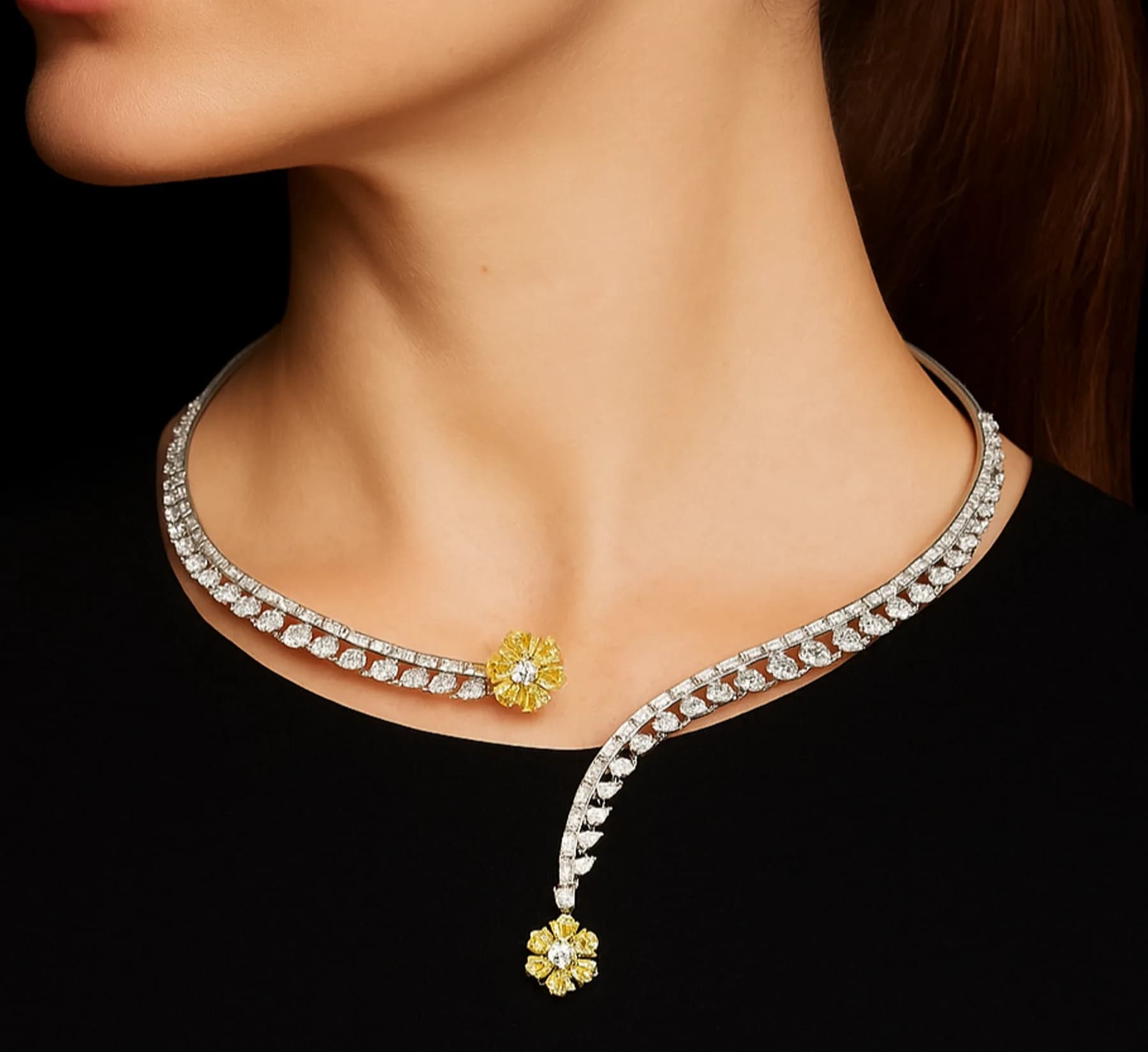 A 7MARK diamond necklace with a fancy-yellow floral accent